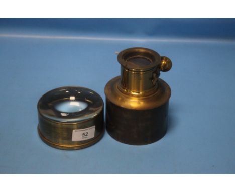 AN ANTIQUE BRASS MAGIC LANTERN LENS TOGETHER WITH ANOTHER (2)