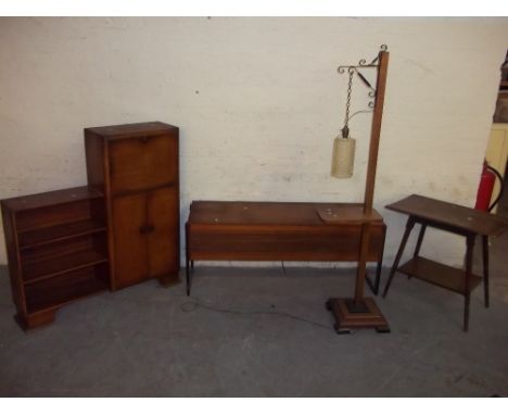 FOUR ITEMS TO INCLUDE A VINTAGE WOODEN TABLE LAMP, A RETRO TEAK RADIOGRAM, AN ANTIQUE HARDWOOD SIDE TABLE AND A RETRO BOOKCAS