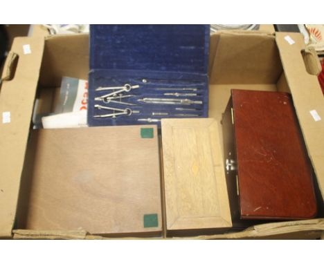 THREE WOODEN BOXES AND A COMPASS SET
