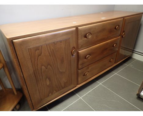 Ercol light elm sideboard on wheels