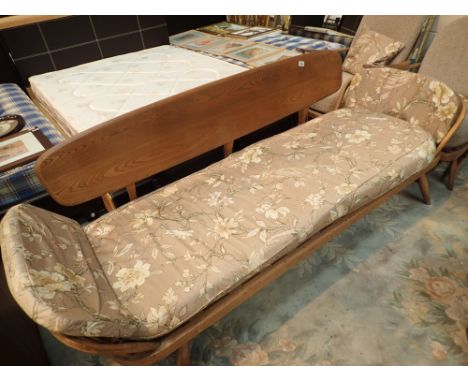 Ercol lounge suite comprising long settee and two armchairs  CONDITION REPORT: Both armchair chairs show a little wear but ot