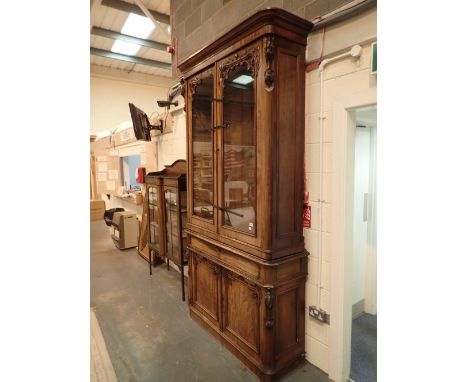 Tall Victorian glazed walnut bookcase above two cupboards 141 x 45 x 268 cm H   CONDITION REPORT:  Interior depths for books 