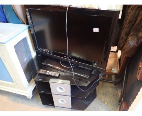 LG TV 32 inch TV with stand and remote  CONDITION REPORT: This item is working at lotting.