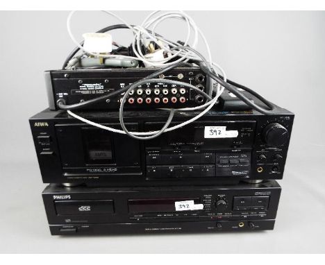 A Philips Digital Compact Cassette recorder model DCC600, an Aiwa Stereo Cassette Deck AD-F800, a Realistic Stereo Mixing Con