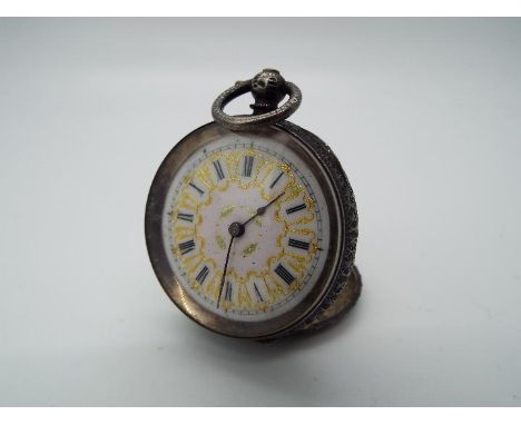 A lady’s silver cased pocket watch, case having engraved decoration, white enamel dial with Roman numerals, gilded decoration