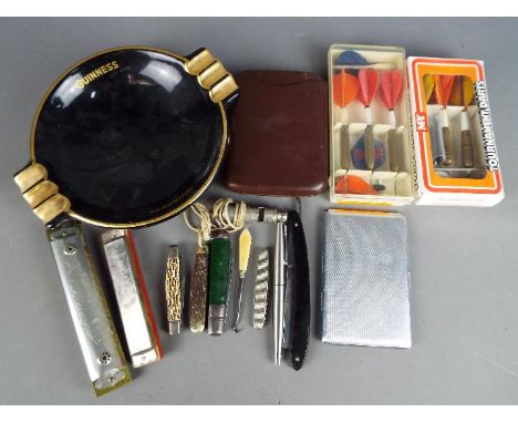 A mixed lot of collectables comprising two harmonicas, Jupiter and World Star, vintage darts, cut throat razor, penknives, Ac