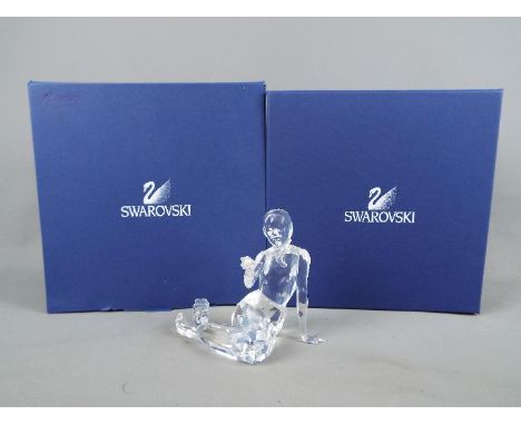 Swarovski - A Swarovski Crystal figurine depicting a mermaid holding a pearl, contained in original box with outer card sleev