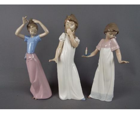 Nao - Three large Nao figurines depicting young girls, largest approximately 29 cm (h). [3]Condition Report: Generally very g