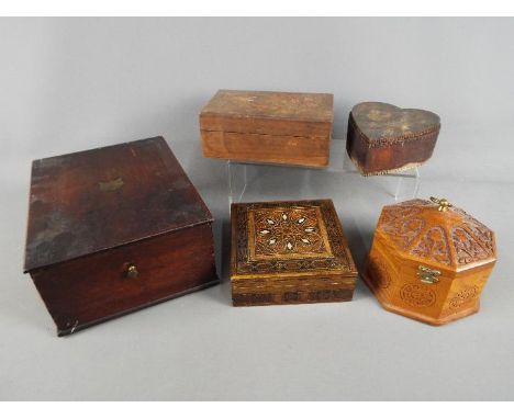 A small collection of wooden trinket boxes and similar, the largest approximately 11 cm x 25 cm x 19 cm. [5]