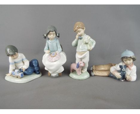 Nao - Four Nao figurines depicting children, largest approximately 18.5 cm (h). [4]Condition Report: Appear in excellent cond
