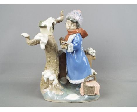 Lladro - A Lladro figural group from the 'Four Seasons' collection entitled 'Winter Frost', # 5287, approximately 26 cm (h).C