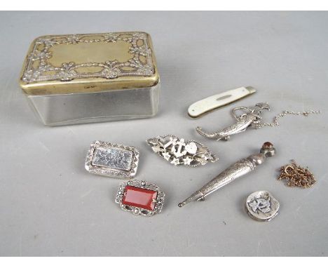 A small quantity of silver and white metal items to include an Edward VII silver and mother of pearl folding knife, Sheffield