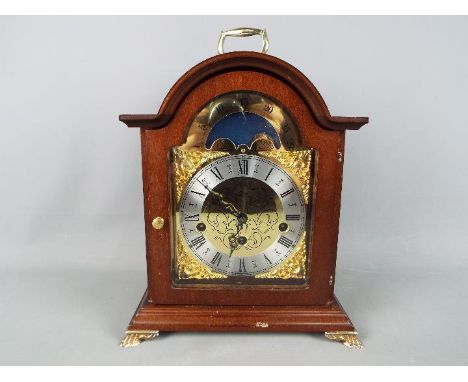 A Franz Hermle moon phase mantel clock.