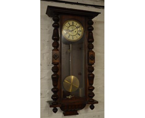 A Vienna style regulator wall clock, retailer Fattorini &amp; Sons, Westgate, Bradford, made in Silesia, Ht 91cm W 42cm.