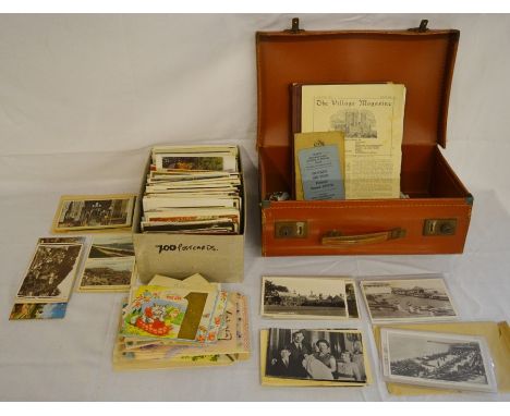 Large collection of old postcards in a small vintage carrying case