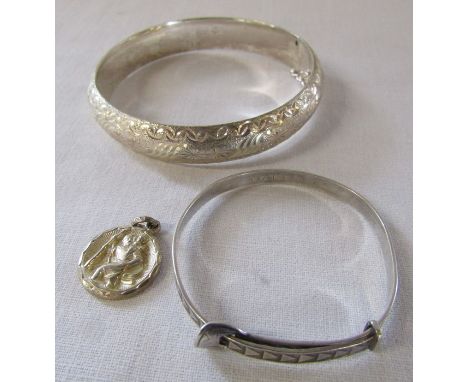Silver ornate bangle, christening bangle and St Christopher total weight 0.77 ozt