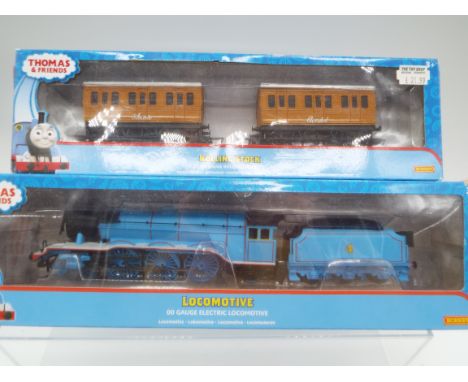 Hornby Thomas and Friends - an OO gauge model 4-6-2 locomotive and tender, 'Gordon the Blue Engine' label on box indicates DC