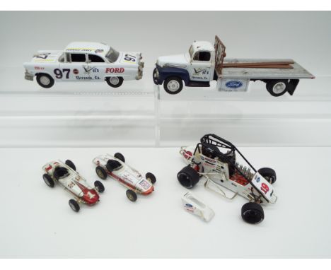 A small collection of unboxed mint or near mint US scale model diecasts comprising an extremely rare Ford Racing cage car, ra