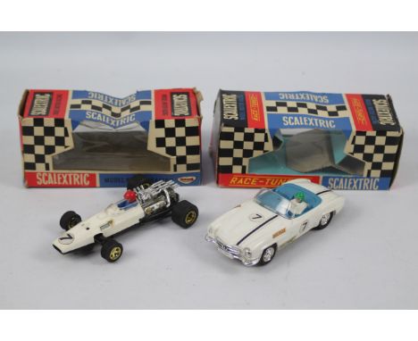 Scalextric - Race Tuned - MiniModels. A boxed C32 Mercedes and C4 Electra. Item appears in Excellent condition, boxes appear 