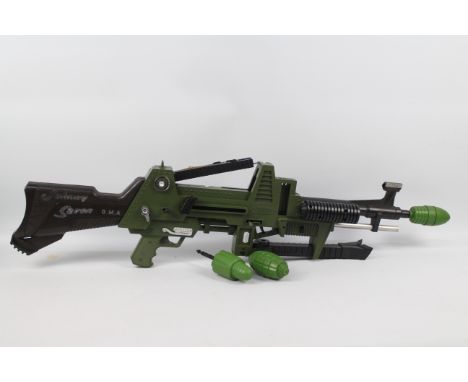 Triang - Topper Toys UK -  An unboxed "Johnny Seven One Man Army" plastic 'Seven Guns in One' toy gun. This desirable toy fin