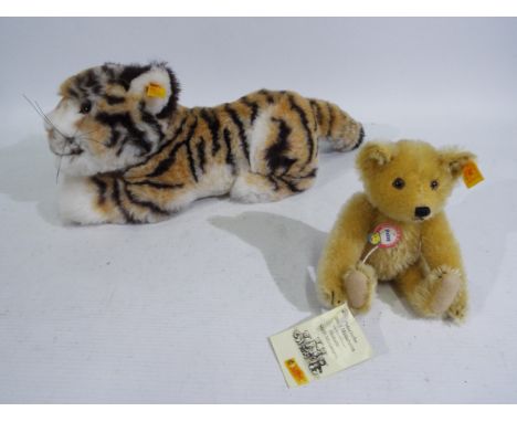 Steiff - A Steiff soft toy and Steiff bear - Lot includes a #0380/30 Steiff soft toy tiger with plastic eyes and whickers and