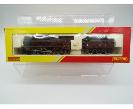 Hornby - an OO gauge model 4-6-0 locomotive and tender, label on box indicates DCC fitted, digital Sound (unchecked), running