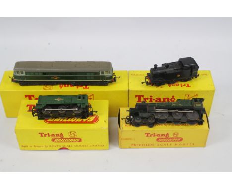 Tri Ang - TT Gauge - Model Railways. A selection of Four Boxed Locomotives Accessories and Locomotives: A T90 black 0-6-0 Tan