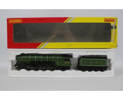 Hornby - an OO gauge model 2-8-2 locomotive and tender, label on box indicates DCC fitted, digital Sound (unchecked), running