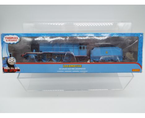 Hornby Thomas and Friends - an OO gauge model 4-6-2 locomotive and tender, 'Gordon the Blue Engine' label on box indicates DC