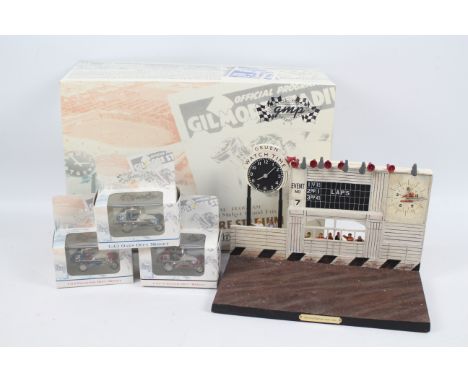 GMP - A boxed GMP Gilmore Stadium Diorama with 3 x boxed Midget Racers in 1:43 scale. The diorama is a little dusty from disp