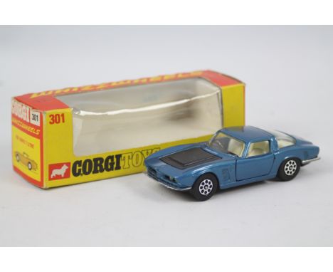 Corgi Toys - Whizzwheels. A boxed 301 Iso Grifo 7 Litre, metallic blue, light blue interior, black bonnet, model appears to b