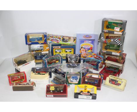 Corgi - Matchbox - Eligor - Matchbox/Dinky - Others - A boxed group of approximately 30 diecast model vehicles in various sca