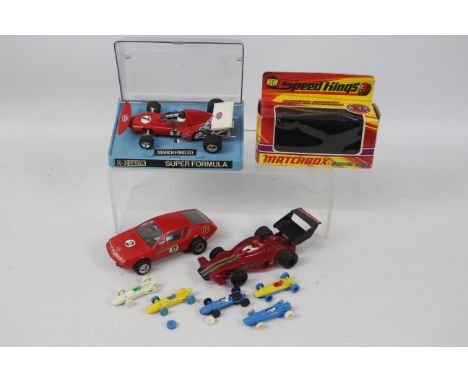 Scalextric - Matchbox - A boxed Scalextric March Ford 721 # C026 in Very Good condition, an unboxed Alpine Renault A310 appea