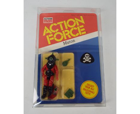 Action Man - Action Force - Muton. A 'Muton' Figure MOC Unpunched, Unopened, in Clear Deflector DC case. Item appears to be M