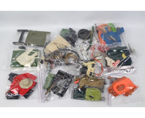 Palitoy - Action Man - A collection of vintage Action man uniforms and accessories. Lot includes such things as Argyle &amp; 