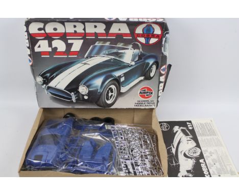 Airfix - A boxed 1:16 scale Cobra 427 kit dated 1982. The parts are still sealed in bags and appear in Mint condition, the in