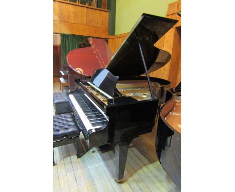 Bechstein (c1966)  
A 5ft grand piano in a bright ebonised case on square tapered legs.  AMENDMENT Is a 5ft 10in Model M gran