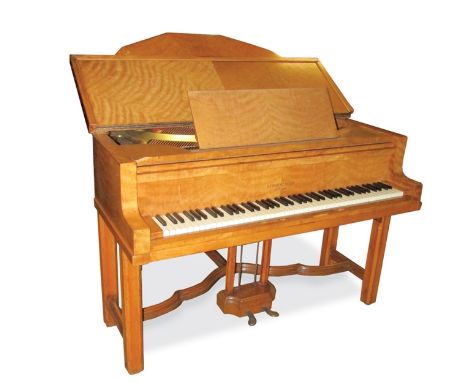 Strohmenger (c1930s)
A 4ft 2in, so-called, 'threepenny-bit' baby grand piano in a light wood Art Deco case, the dual square t