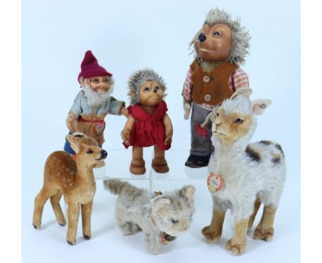 Six post-war Steiff animals, including Lama with tag and button, 6 ½” (16.5cm) tall, Tabby cat with tag, Gucki Dwarf with tag