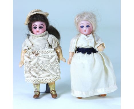 A miniature Kammer & Reinhardt bisque head doll, German circa 1910, all original doll with weighted brown glass eyes, open mo