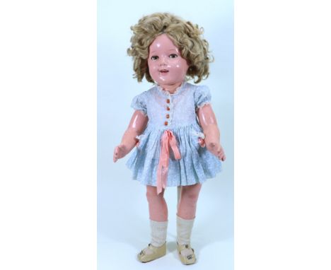 A large all original Ideal Novelty Toy Corp. Shirley Temple composition doll  in original box, American 1930s, with weighted 