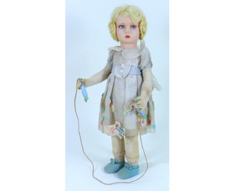 A Lenci ‘Skipping’ felt doll, Italian circa 1930, the pressed head with painted blue side-glancing eyes, with shading under e