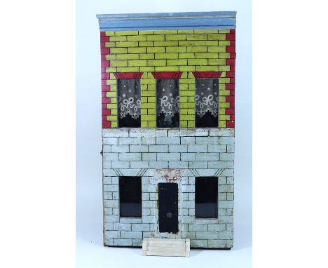 A Silber & Fleming painted wooden dolls house and contents, German circa 1890, the red brick, yellow and cream façade with pa