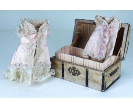 A very sweet miniature trunk and clothes for mignonette doll,  the cream linen covered trunk with black leather straps and ha