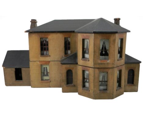 ‘Shamrock House’ a fine and early wooden dolls house, probably Irish, late 18th  century, with painted stone exterior, the fa