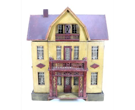 A Moritz Gottschalk red roof dolls house and contents, German circa 1920s, the painted wooden ochre exterior with brown decor