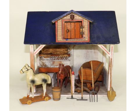 A Moritz Gottschalk model 2437 model stables, German circa 1900, the painted white and red wooden frame with paper lithograph