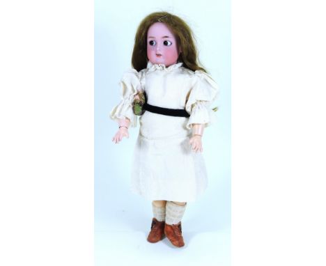 A sweet Kammer & Reinhardt /S&H bisque head ‘flirty’ doll, German circa 1910, with brown glass ‘flirty-eyes’, finely painted 