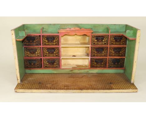 Two Christian Hacker grocery store room sets, German 1890s, the larger store with painted cream and blue exterior, bright gre