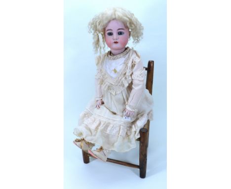 A Large Kammer & Reinhardt/Simon & Halbig bisque head girl doll, German circa 1910, with weighted blue glass eyes, open mouth